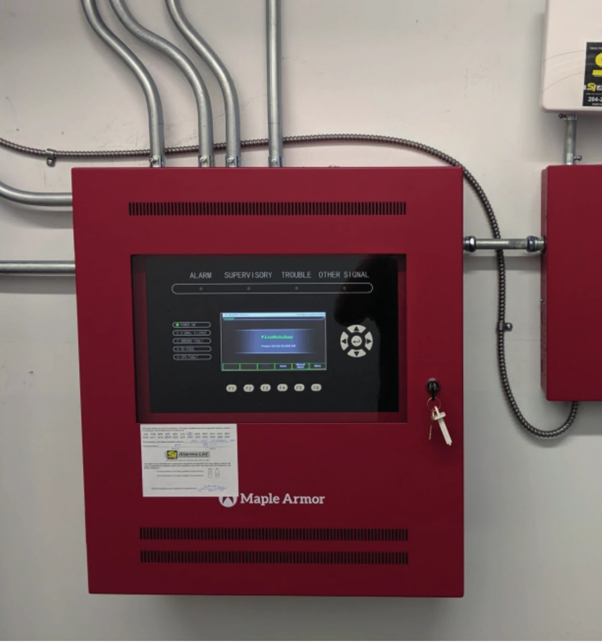 Fire alarm control panel installed at the Selkirk Avenue project